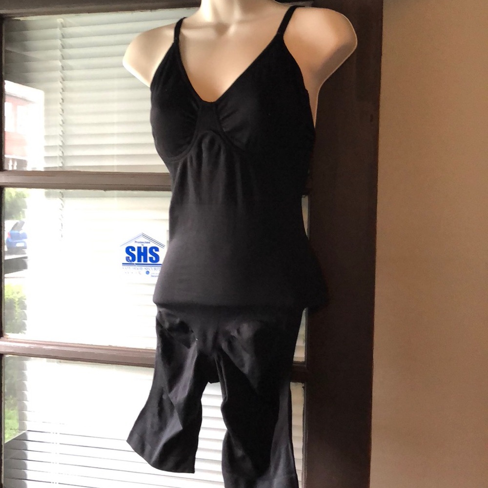 1 piece Black Spandex  Shaper  practically new.